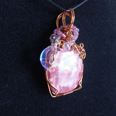 Pink Thulite copper wire wrapped stone crystal necklace with aurora borealis…