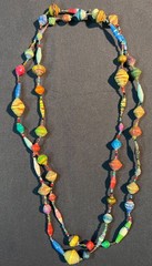 Boho chic necklace is handcrafted from recycled paper beads in various shapes