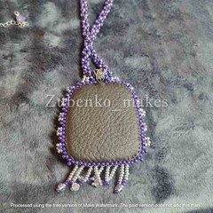 Elegant pendant with white and purple amethyst, beads and long beaded rope