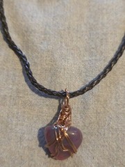 Pink Agate Pendant On A Brown Leather Necklace