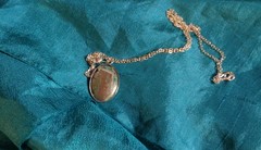 Artisan crafted,1” oval agate cab in stainless bezel, on 22” delicate silver pla