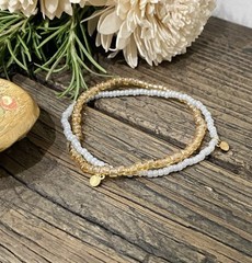Dainty Seed Bead Twisted Bracelet With Starburst Charms