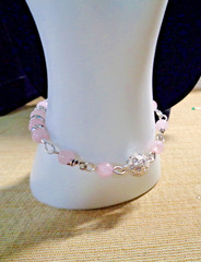 Artisan crafted 7” bracelet of rose quartz, silver plated rhinestone spacers and