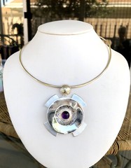 Pendant Amethyst Cab in Dimensional Setting Four Radiating Blades 16” Neck Ring