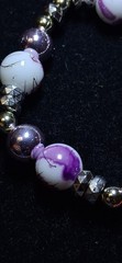 Handcrafted white and purple floral patterned Glass bead bracelet earring set.