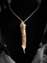 One of a kind jewelry made from real pieces of wood coated in resin