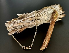 Handmade one of a kind jewelry made from real pieces of wood coated in resin