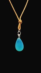 Uranium turquoise colored Czech glass bead 28mm teardrop pendant on tan cord 18″