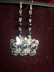 handcrafted black beaded skull butterfly charm earrings