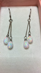#45A-(4)-7x5mm White Lab Created Opals set in 925 Sterling Silver Earrings