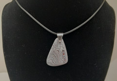 Fordite Pendant Necklace-Reversible, Handmade, on 18/20″ adjustable Necklace