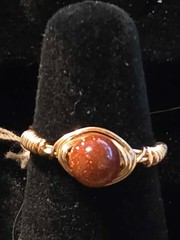 Handmade sizes 4 – 15 Wire-Wrapped Goldstone Rings with Gold-Tone Plated Wire