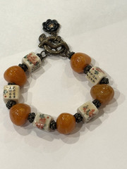 Asian Style Artisan Bracelet with Painted Ceramic Beads and Amber Colored Stones