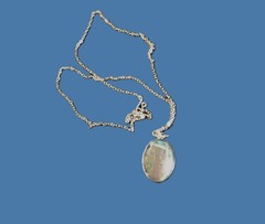 Artisan crafted,1” oval agate cab in stainless bezel, on 22” delicate silver pla