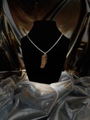 One of a kind jewelry made from real pieces of wood coated in resin