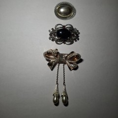 Sterling silver vintage brooch Pin lot Bow Lot Of 3. 46.8 grams Costume jewelry.