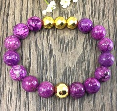 Purple sugilite beaded bracelet with gold ball pendant healing stretch gemstone