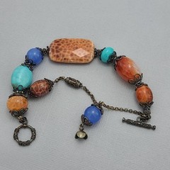 Handmade Leopard Skin Agate Turquoise Boho Bracelet with Sterling Silver Beads.