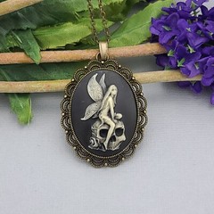 Antiqued Brass Vintage Style Cameo Necklace. (Fairy on Skull).