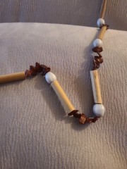 Natural materials necklace with bamboo tubes, seeds, and shell beads