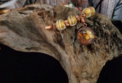 Artisan crafted, 15mm resin and dried flower pendant on strand of vintage yellow
