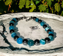 7″ semi-precious striped blue agate and hematite beaded bracelet w/toggle clasp