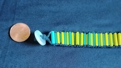 6 1/2 Inch Long Glass Bead, Hemp Twine, Polyester Thread, Plastic Button Closure
