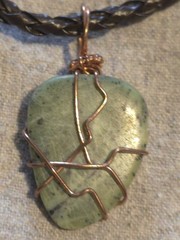 Jade Pendant On A Brown Leather Necklace