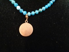 Artisan crafted,Abalone pendant on 18” faceted apatite and copper strand. Beauti
