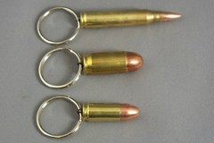 Three Bullet pendants or key rings 9mm, 223 cal and 45