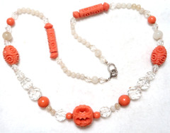 VINTAGE CARVED CORAL COLOR LUCITE WITH CLEAR CRYSTAL AND GLASS NECKLACE