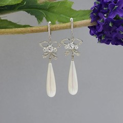 Handcrafted White Pearl Shell Pearl Cubic Zirconia Dangle Earrings.