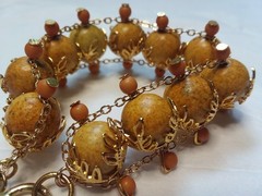 7.5″ 12 mm Center Sunflower Colored Bead Bracelet W/ Filigree Accent 06-01-2026