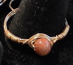 Handmade sizes 4 – 15 Wire-Wrapped Goldstone Rings with Gold-Tone Plated Wire