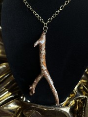 One of a kind jewelry made from real pieces of wood coated in resin