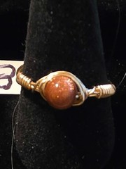 Handmade sizes 4 – 15 Wire-Wrapped Goldstone Rings with Gold-Tone Plated Wire