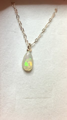 #235- .65ct Genuine Ethiopian Welo Opal on a Sterling Silver Chain