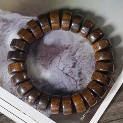 Round Buddhist prayer beads made of natural wood perfect for meditation