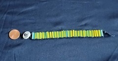 6 1/2 Inch Long Glass Bead, Hemp Twine, Polyester Thread, Plastic Button Closure