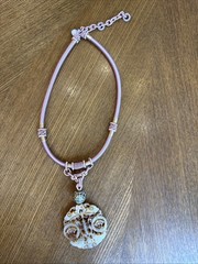 Hand-carved Necklace With pendant, reminiscent of traditional Asian carvings