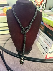 handmade beaded lariat Necklace with a knotted design