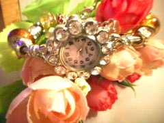 Hand assembled watch/bracelet with glass beads&silver tone charms&a watch