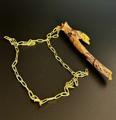 Handmade one of a kind jewelry made from real pieces of wood coated in resin
