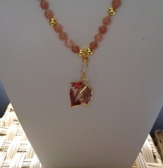 Artisan crafted, 18k gold plated Echinachea , and strawberry quartz leaf, on 18”