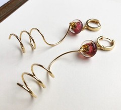 Unmatched earrings dangle, large spiral earrings gold tone