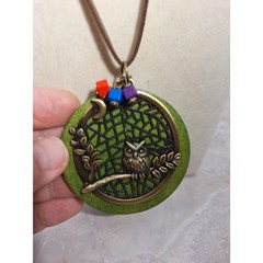 A Wood Disc Necklace With Owl Motif Leather Cord Whimsical Nature Inspired
