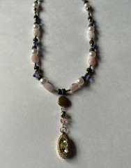 Handmade Wire Necklace With Gold Pendant W/ Green Gems Hanging From Linked Beads