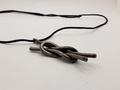 Hand Forged Iron Pendant On Adjustable Black Cordage Necklace Eternity Love Knot